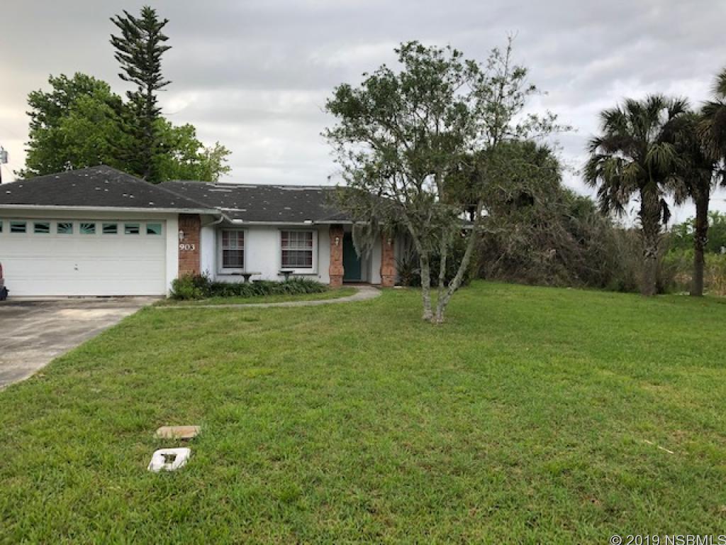 903 20th Street Edgewater, FL 32141 - Photo 1 of 1 a house view with a garden space