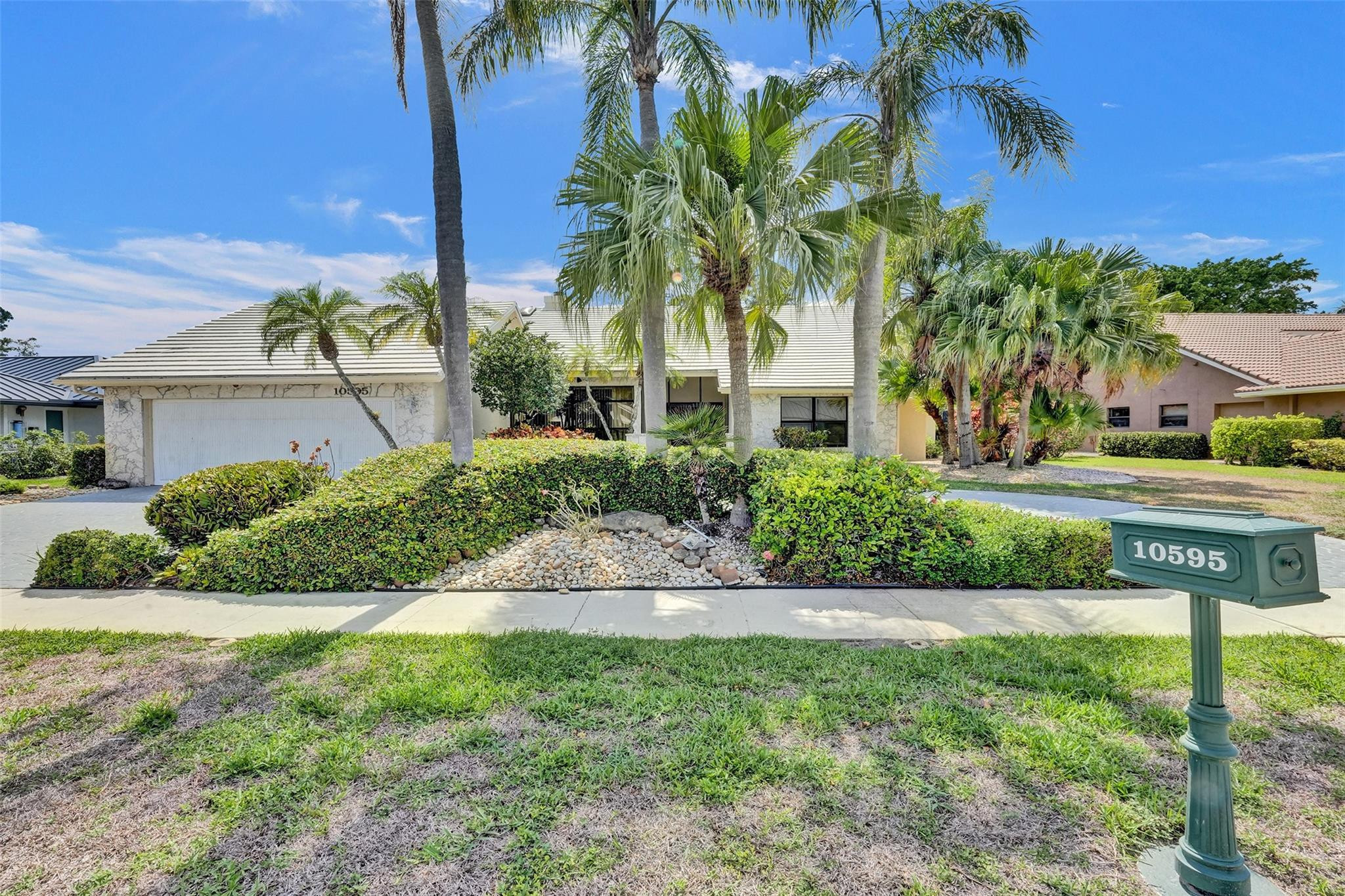 10595 Boca Woods Lane Boca Raton, FL 33428 - Photo 27 of 28 View from the street.