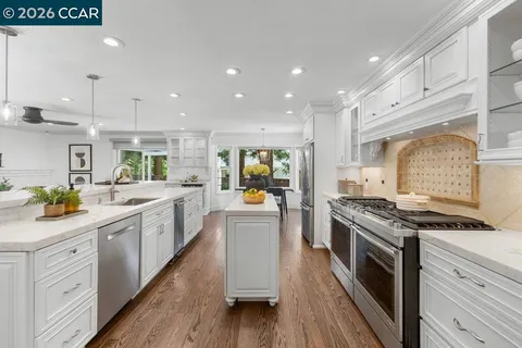 a dining room with furniture window wooden floor