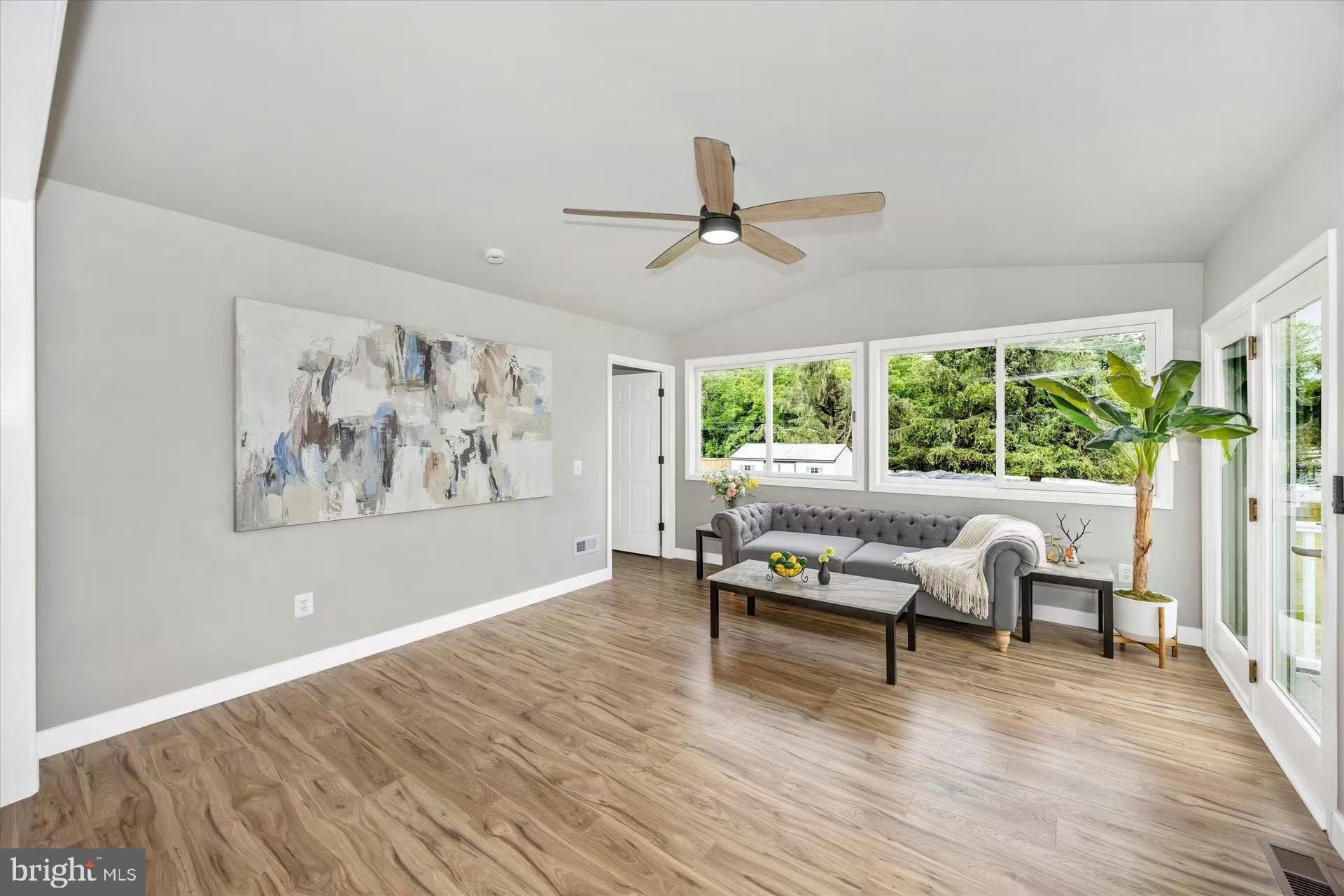 1212 Random Ridge Road Westminster, MD 21157 - Photo 14 of 36 a living room with furniture and a large window