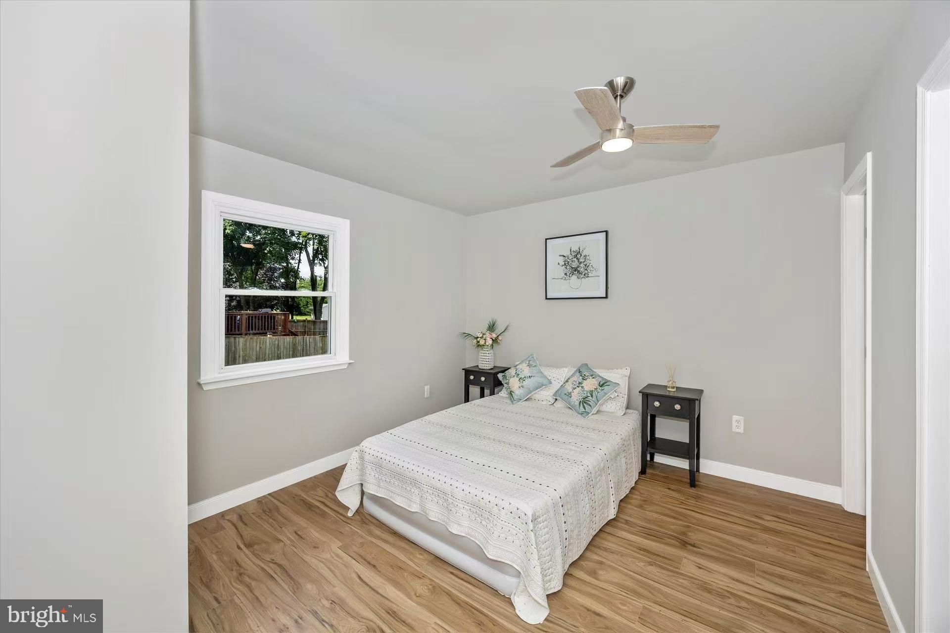 1212 Random Ridge Road Westminster, MD 21157 - Photo 18 of 36 a bedroom with a bed and a window