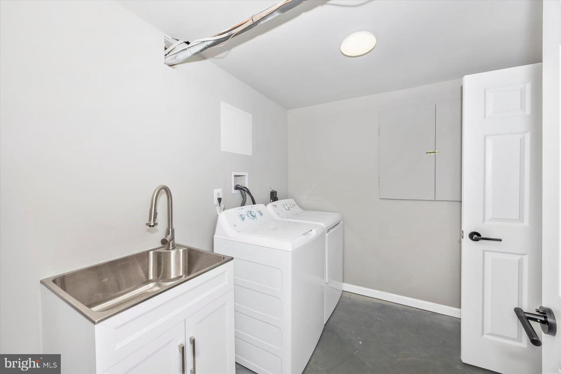 1212 Random Ridge Road Westminster, MD 21157 - Photo 30 of 36 a bathroom with a sink and mirror