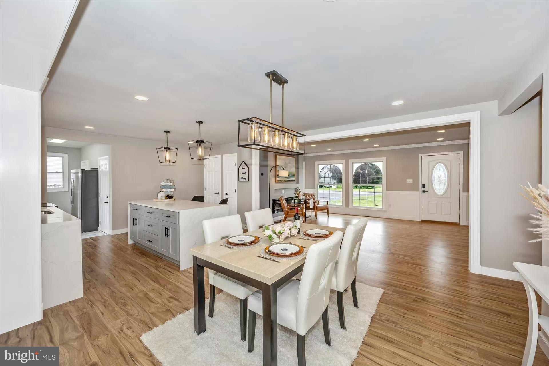 1212 Random Ridge Road Westminster, MD 21157 - Photo 7 of 36 a view of a dining room with furniture window and wooden floor
