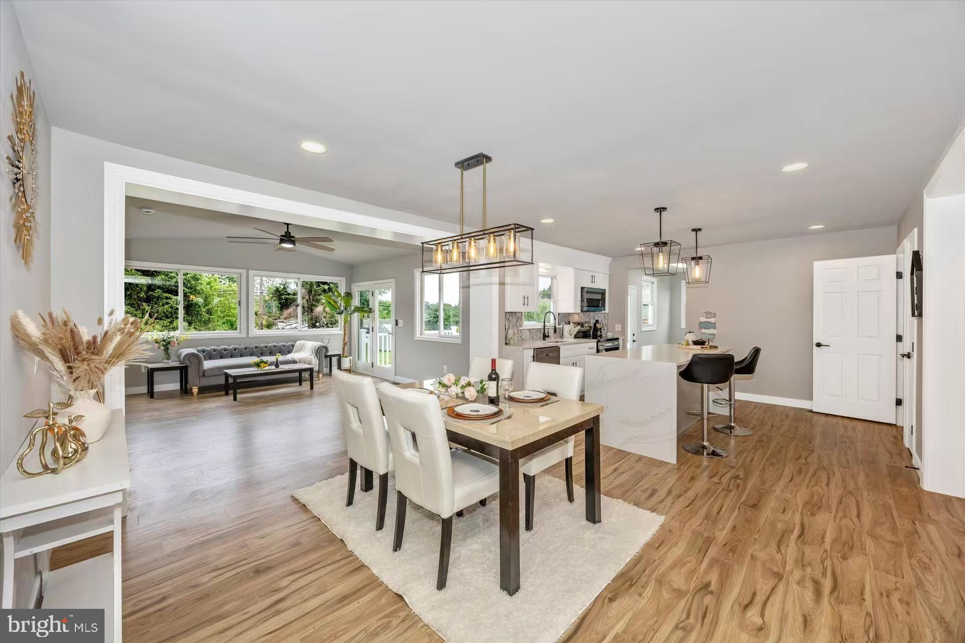1212 Random Ridge Road Westminster, MD 21157 - Photo 8 of 36 a living room with furniture and a wooden floor