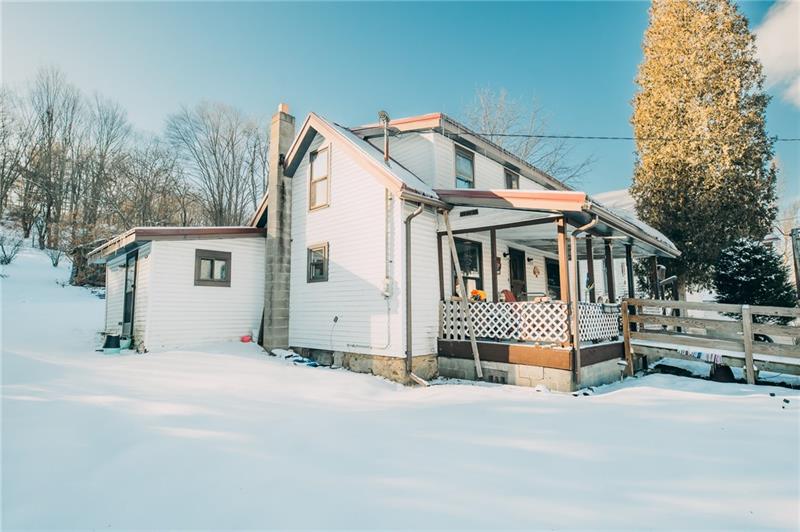 71 Maple Street Burnside, PA 15721 - Photo 3 of 24 a view of house and outdoor space
