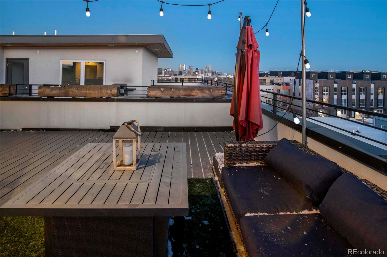 1933 Grove Street Denver, CO 80204 - Photo 26 of 29 a kitchen with sink and view of living room