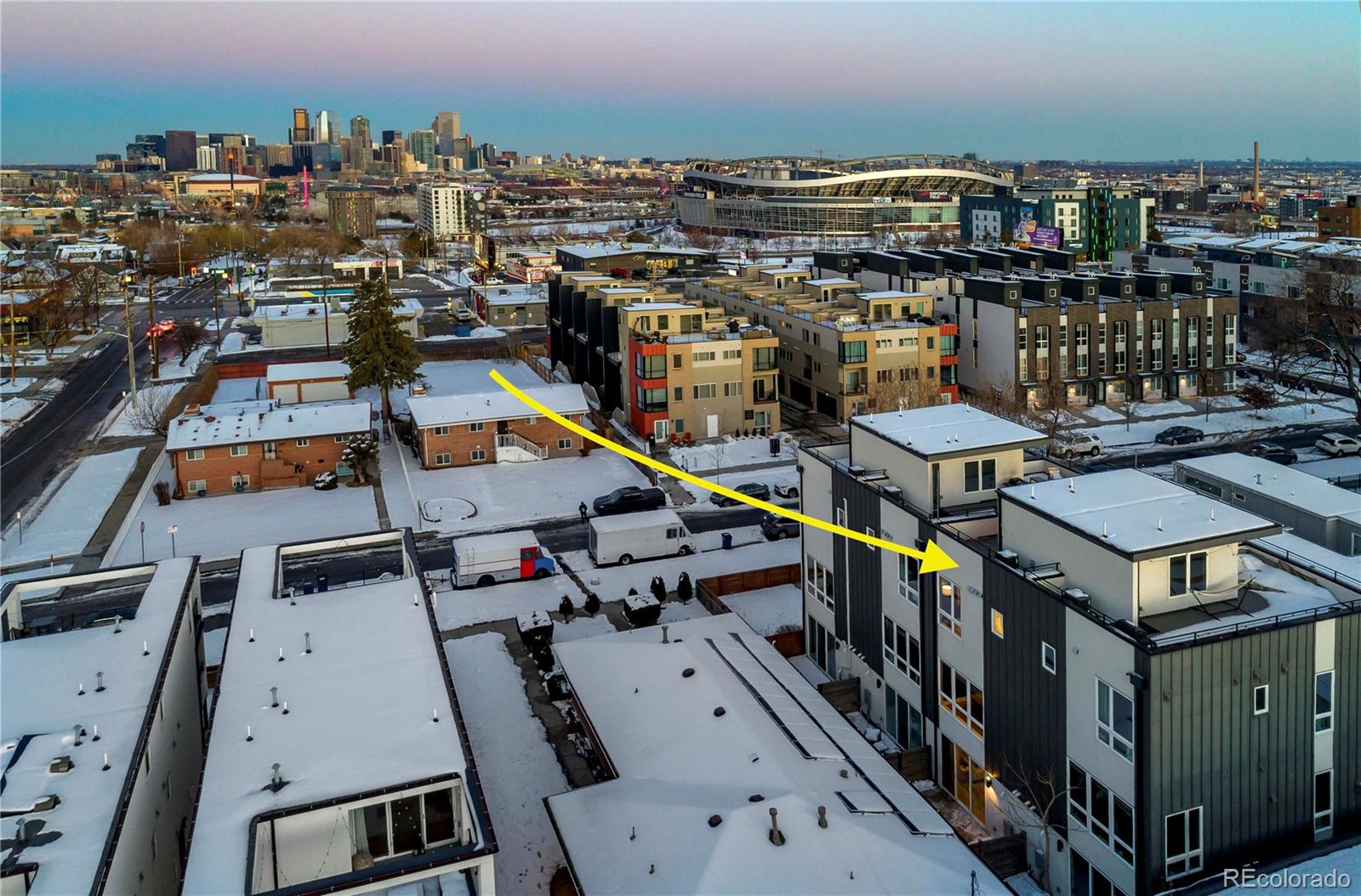 1933 Grove Street Denver, CO 80204 - Photo 3 of 29 an aerial view of a houses with street view