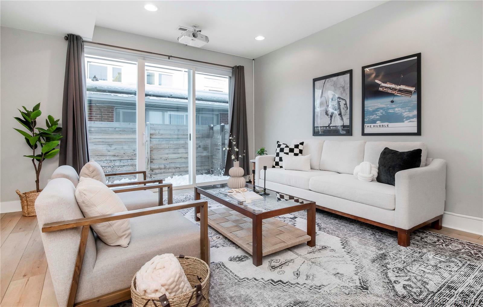 1933 Grove Street Denver, CO 80204 - Photo 9 of 29 a living room with furniture and wooden floor