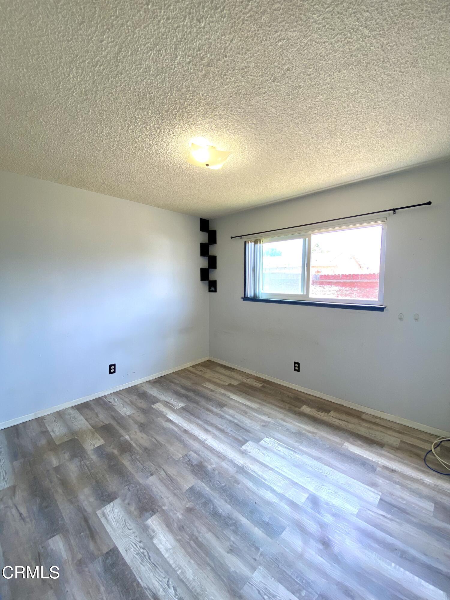 930 West Olive Street Oxnard, CA 93033 - Photo 16 of 22 a view of an empty room and window