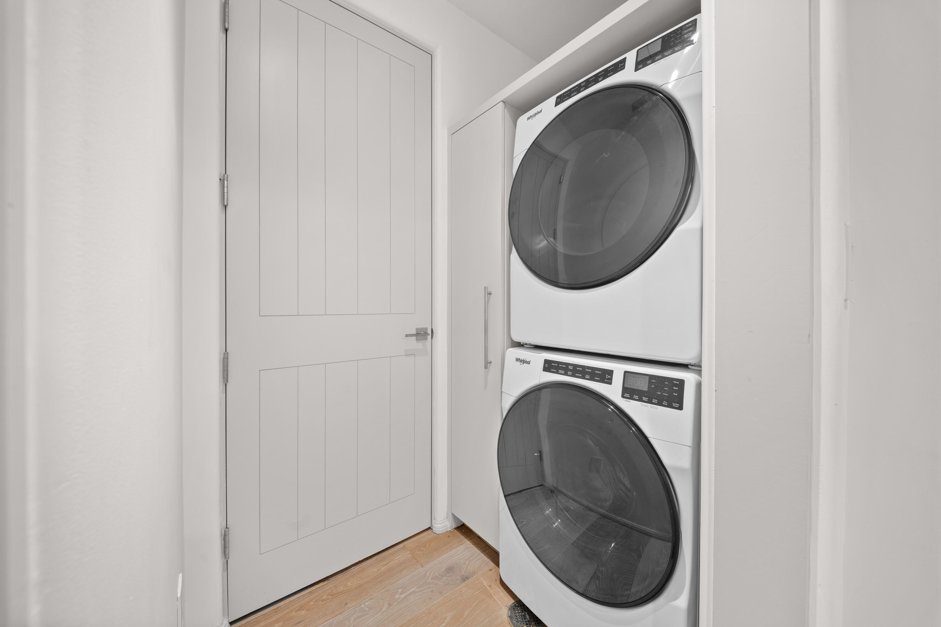 45 West Solaire Way Inlet Beach, Unit 107 Inlet Beach, FL 32461 - Photo 13 of 47 a close view of a utility room with dryer and washer