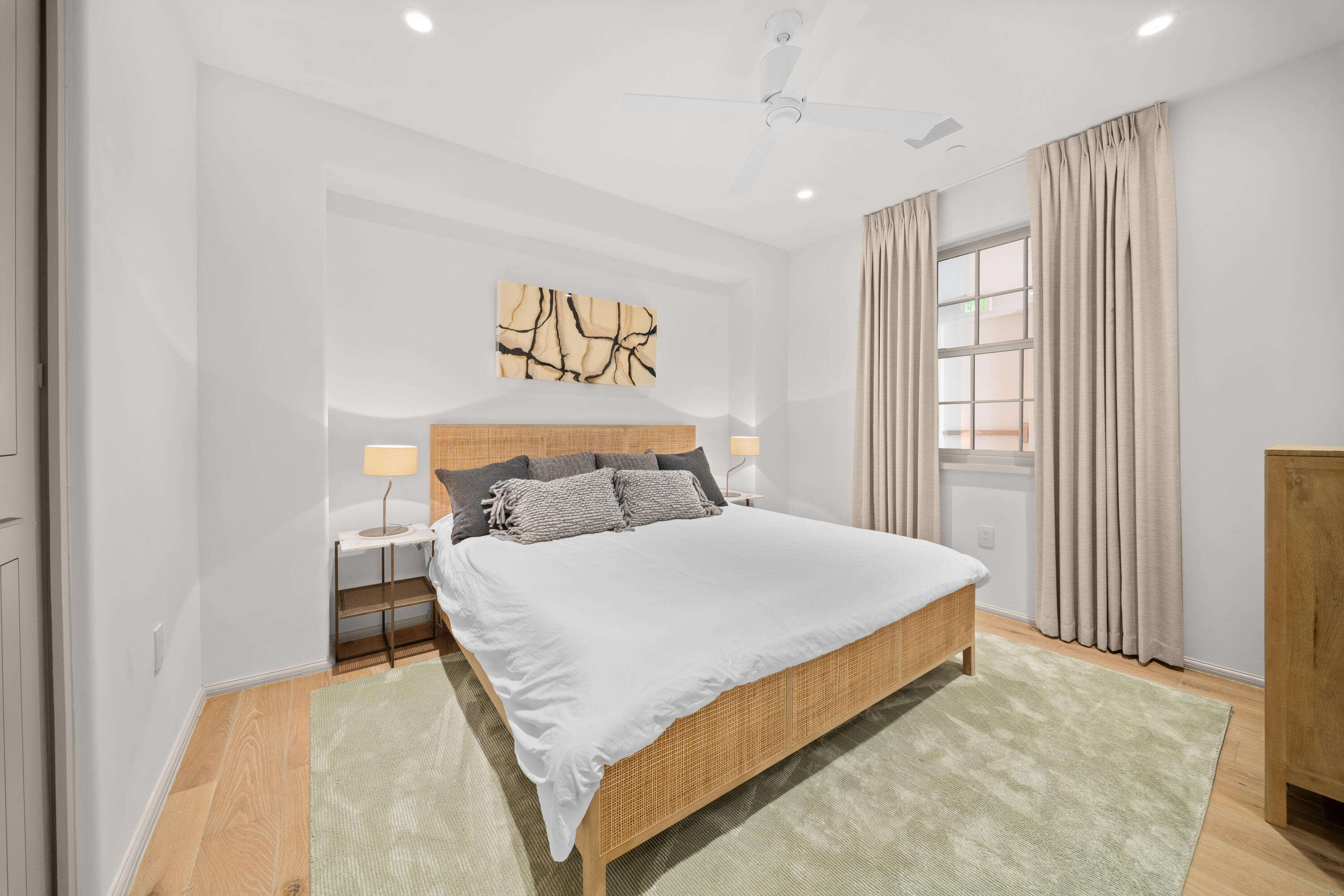 45 West Solaire Way Inlet Beach, Unit 107 Inlet Beach, FL 32461 - Photo 17 of 47 a bedroom with a large bed and a window