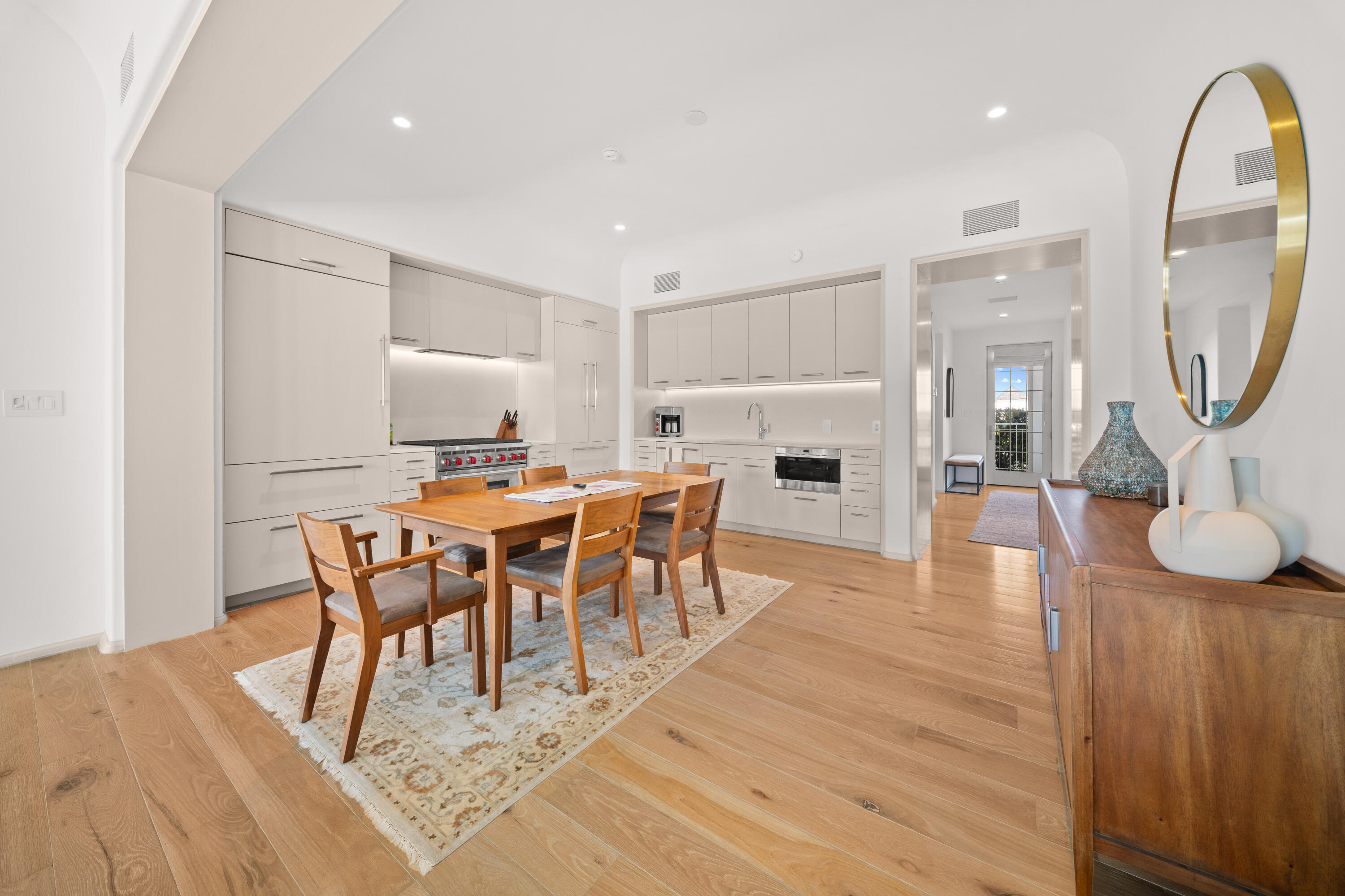 45 West Solaire Way Inlet Beach, Unit 107 Inlet Beach, FL 32461 - Photo 21 of 47 a view of a dining room with furniture and wooden floor
