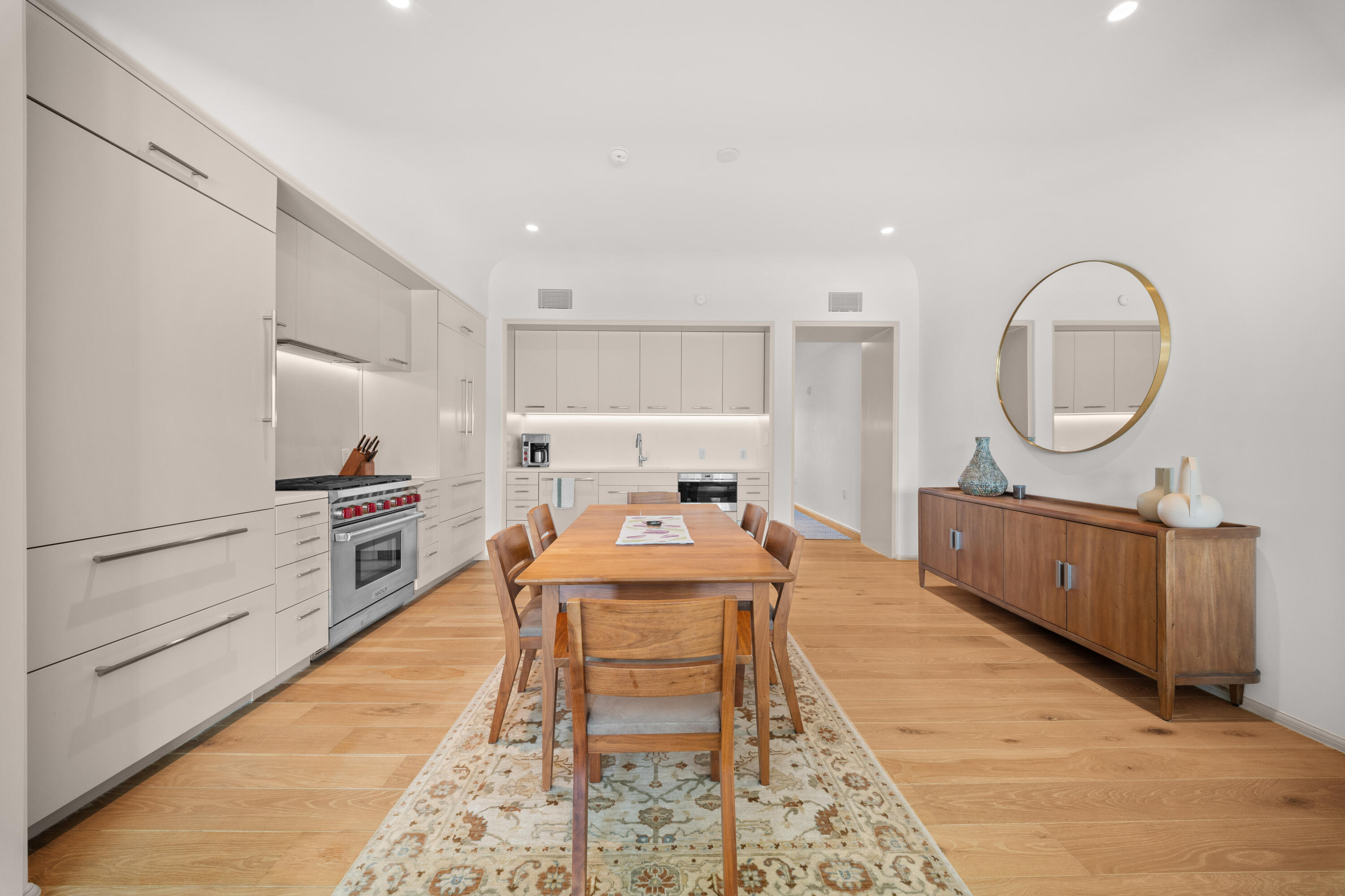 45 West Solaire Way Inlet Beach, Unit 107 Inlet Beach, FL 32461 - Photo 24 of 47 a room with a bed a mirror and a table