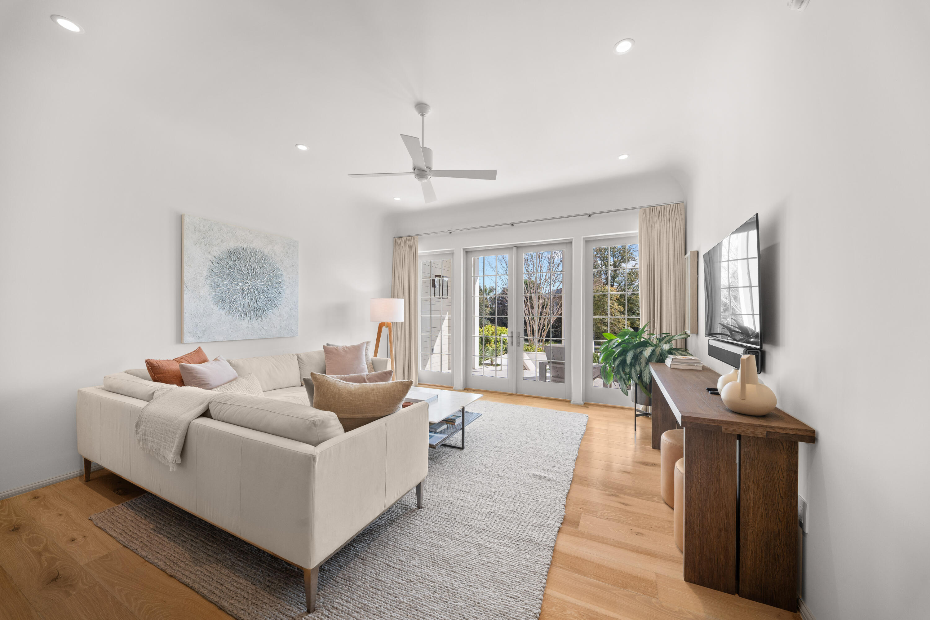 45 West Solaire Way Inlet Beach, Unit 107 Inlet Beach, FL 32461 - Photo 28 of 47 a living room with furniture and a large window