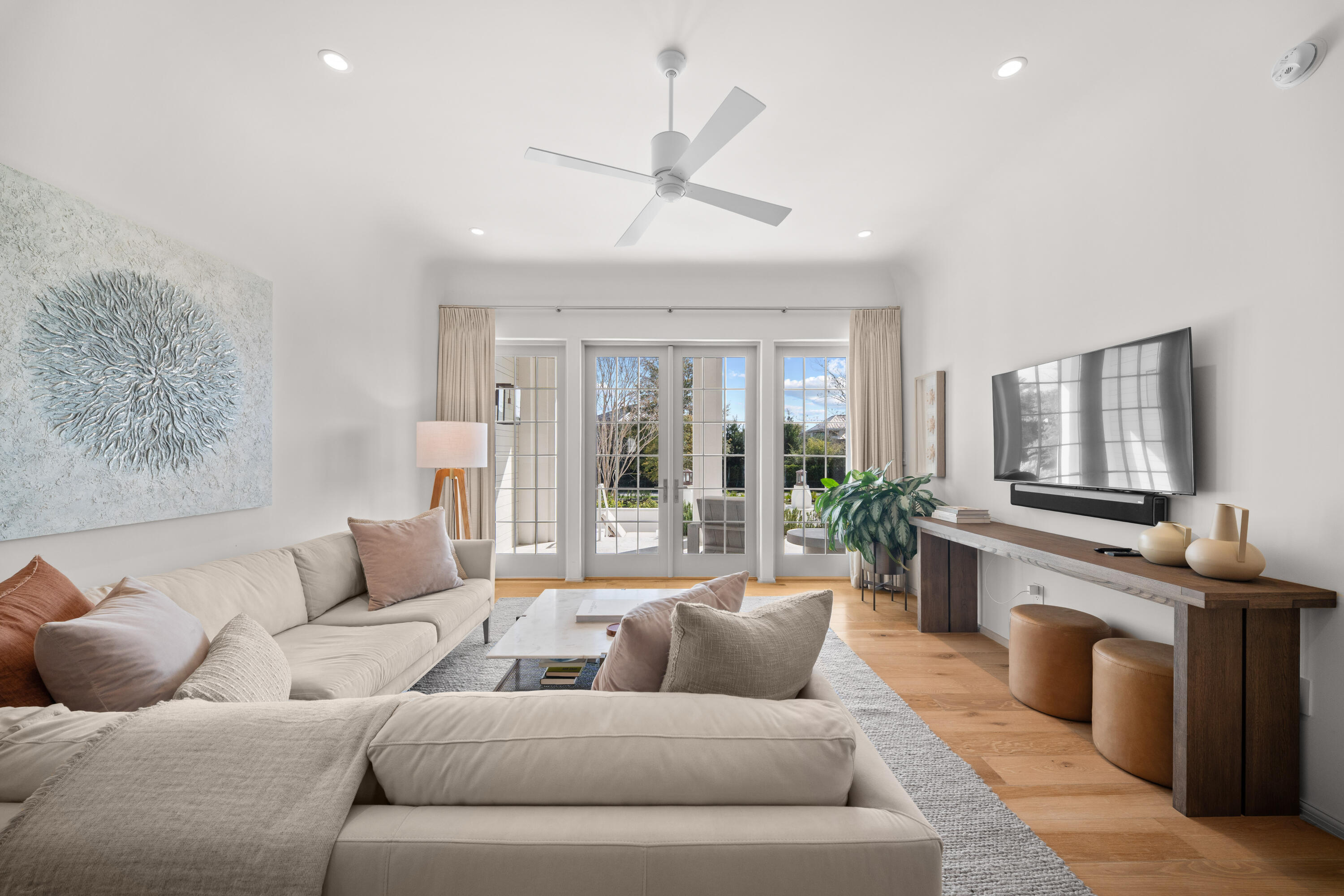 45 West Solaire Way Inlet Beach, Unit 107 Inlet Beach, FL 32461 - Photo 29 of 47 a living room with furniture kitchen view and a large window