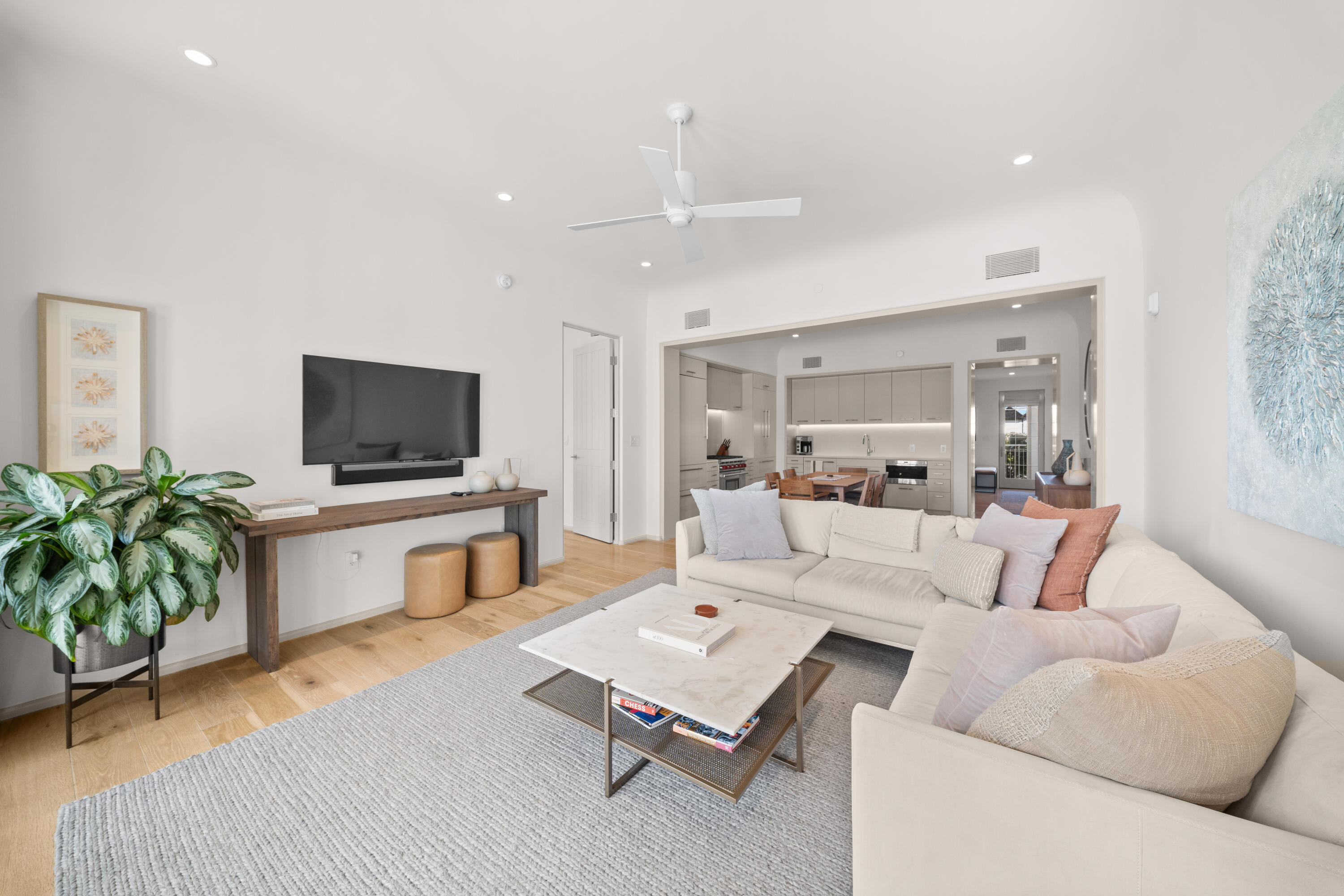 45 West Solaire Way Inlet Beach, Unit 107 Inlet Beach, FL 32461 - Photo 32 of 47 a living room with furniture and a flat screen tv