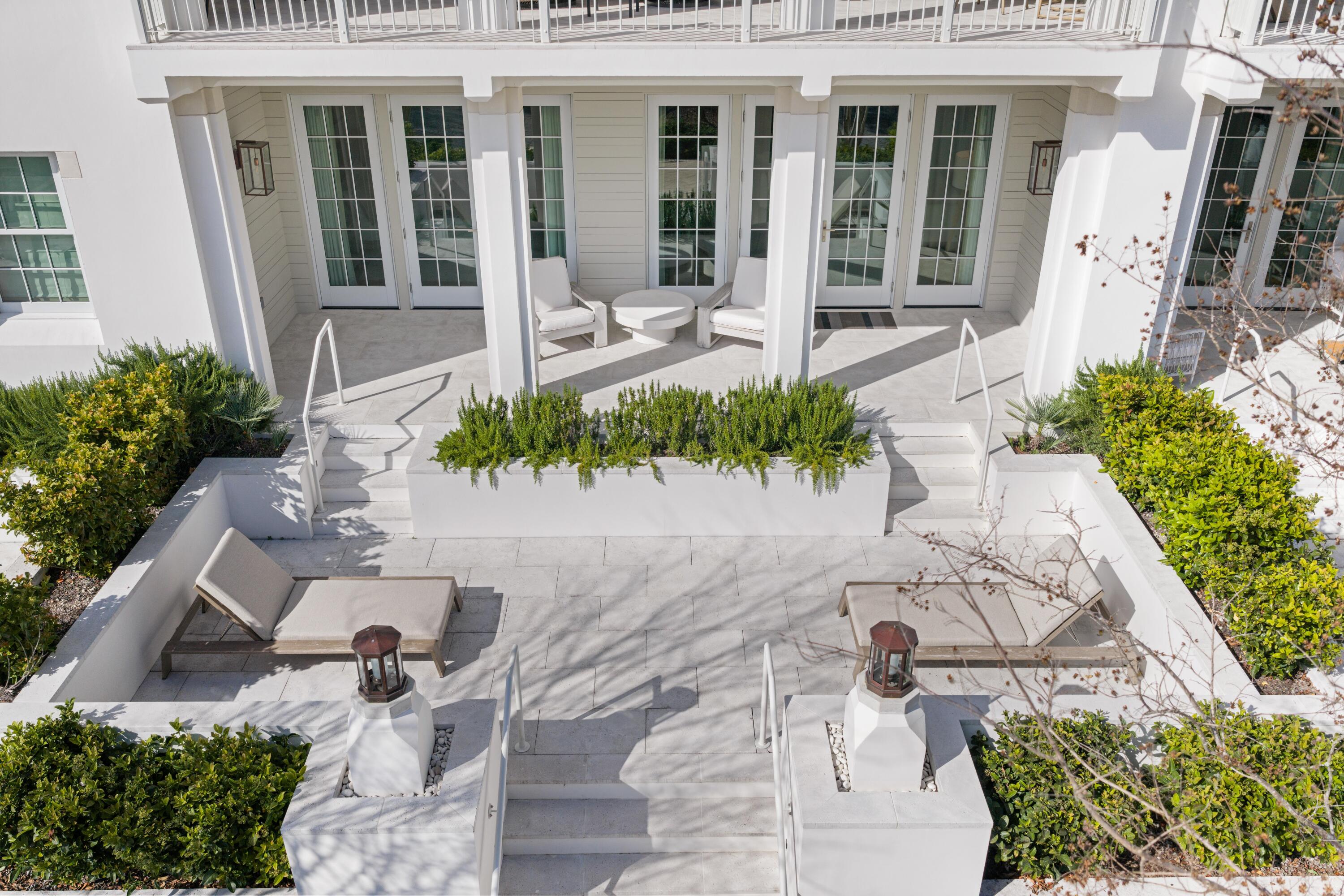 45 West Solaire Way Inlet Beach, Unit 107 Inlet Beach, FL 32461 - Photo 43 of 47 front view of a house with a patio