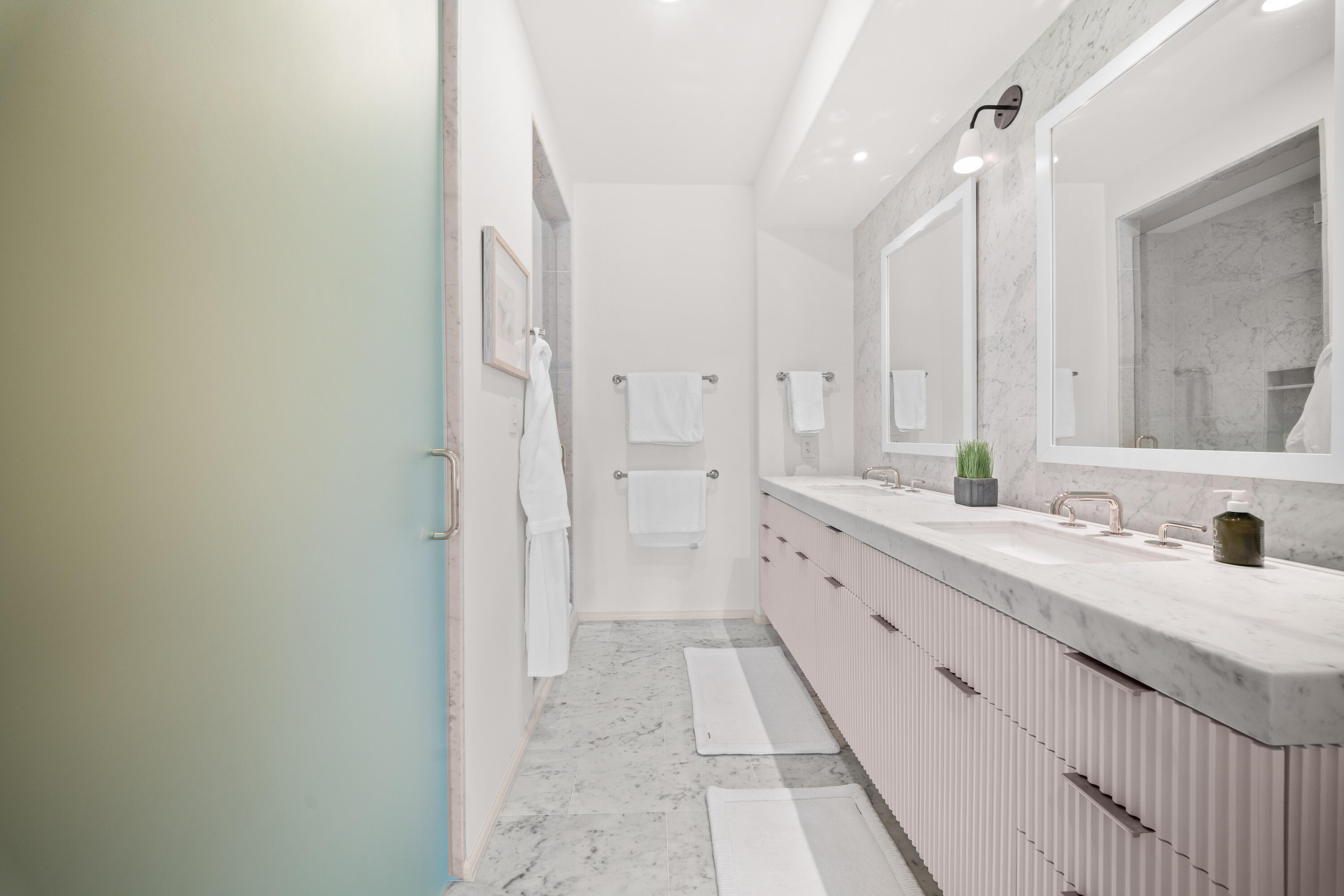 45 West Solaire Way Inlet Beach, Unit 107 Inlet Beach, FL 32461 - Photo 9 of 47 a spacious bathroom with a double vanity sink and a mirror