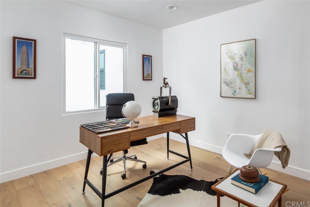 2589 El Sol Avenue Altadena, CA 91001 - Photo 16 of 28 a view of a workspace with furniture and a window