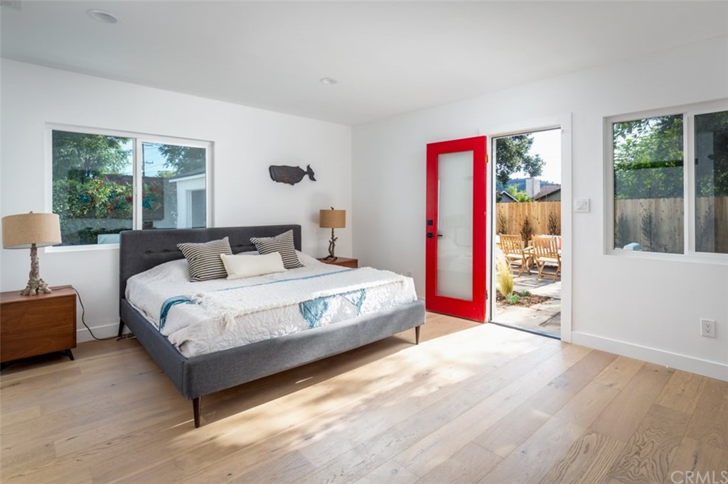 2589 El Sol Avenue Altadena, CA 91001 - Photo 20 of 28 a spacious bedroom with a bed and a large window