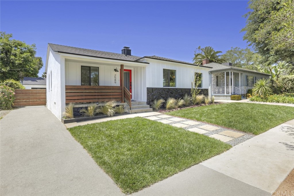 2589 El Sol Avenue Altadena, CA 91001 - Photo 2 of 28 a front view of house with yard and green space