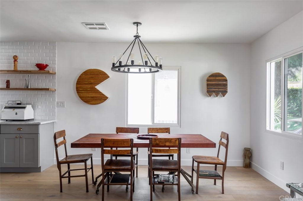 2589 El Sol Avenue Altadena, CA 91001 - Photo 6 of 28 a view of a dining room with furniture and chandelier
