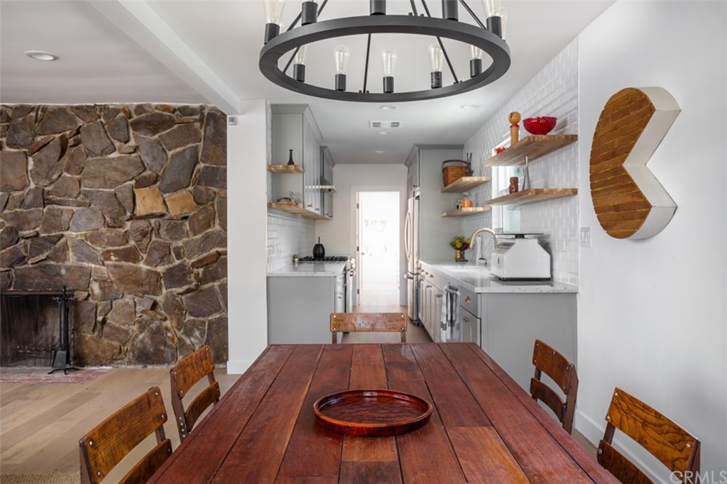 2589 El Sol Avenue Altadena, CA 91001 - Photo 8 of 28 a room with furniture a rug and a fireplace