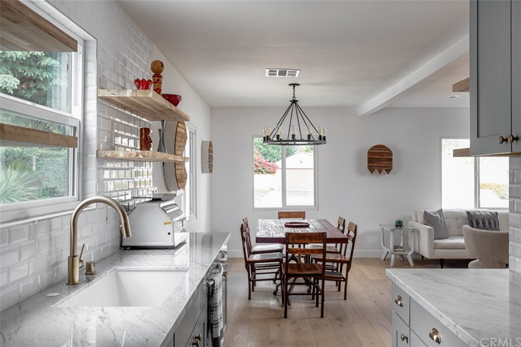 2589 El Sol Avenue Altadena, CA 91001 - Photo 9 of 28 a view of a dining room with furniture window and outside view