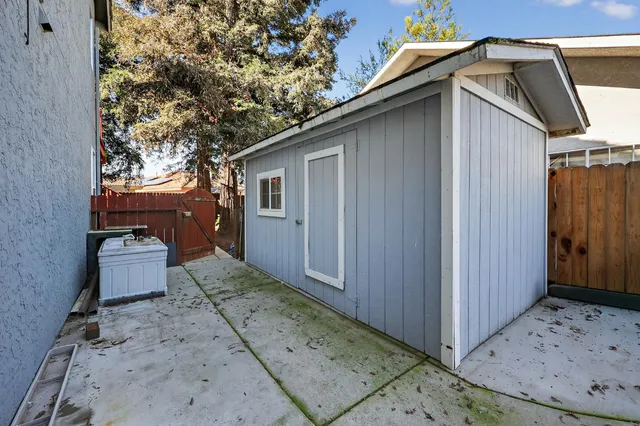 a view of yard with patio