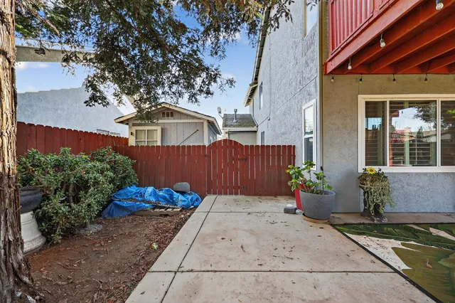 a view of deck with wooden floor and fence