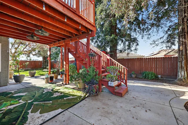 a view of outdoor space with deck and backyard
