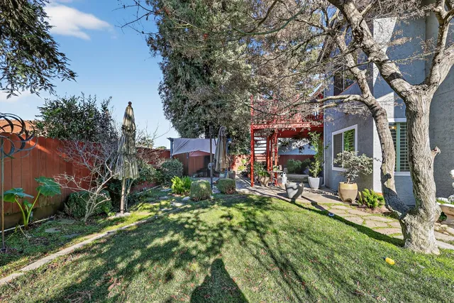 a bed room with a bed and a window