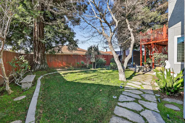 a picture of a room with furniture and white walls