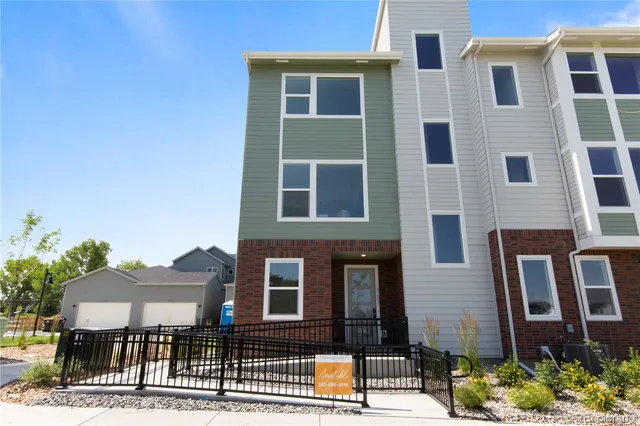 a front view of a building with balcony