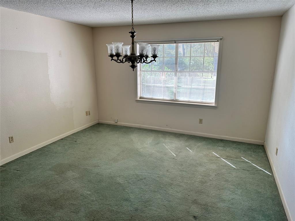 419 Irving Bluff Road Shreveport, LA 71107 - Photo 5 of 19 an empty room with a window