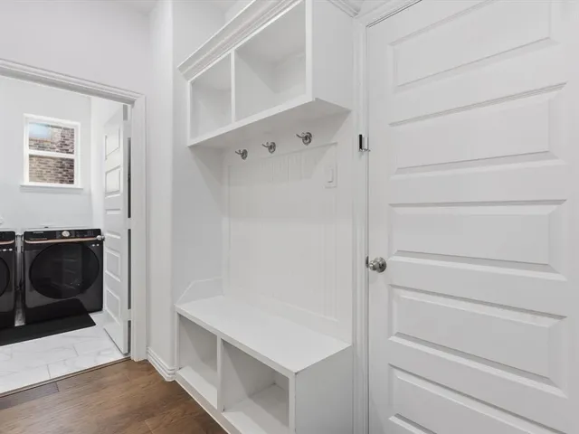 a bathroom with a tub and a sink