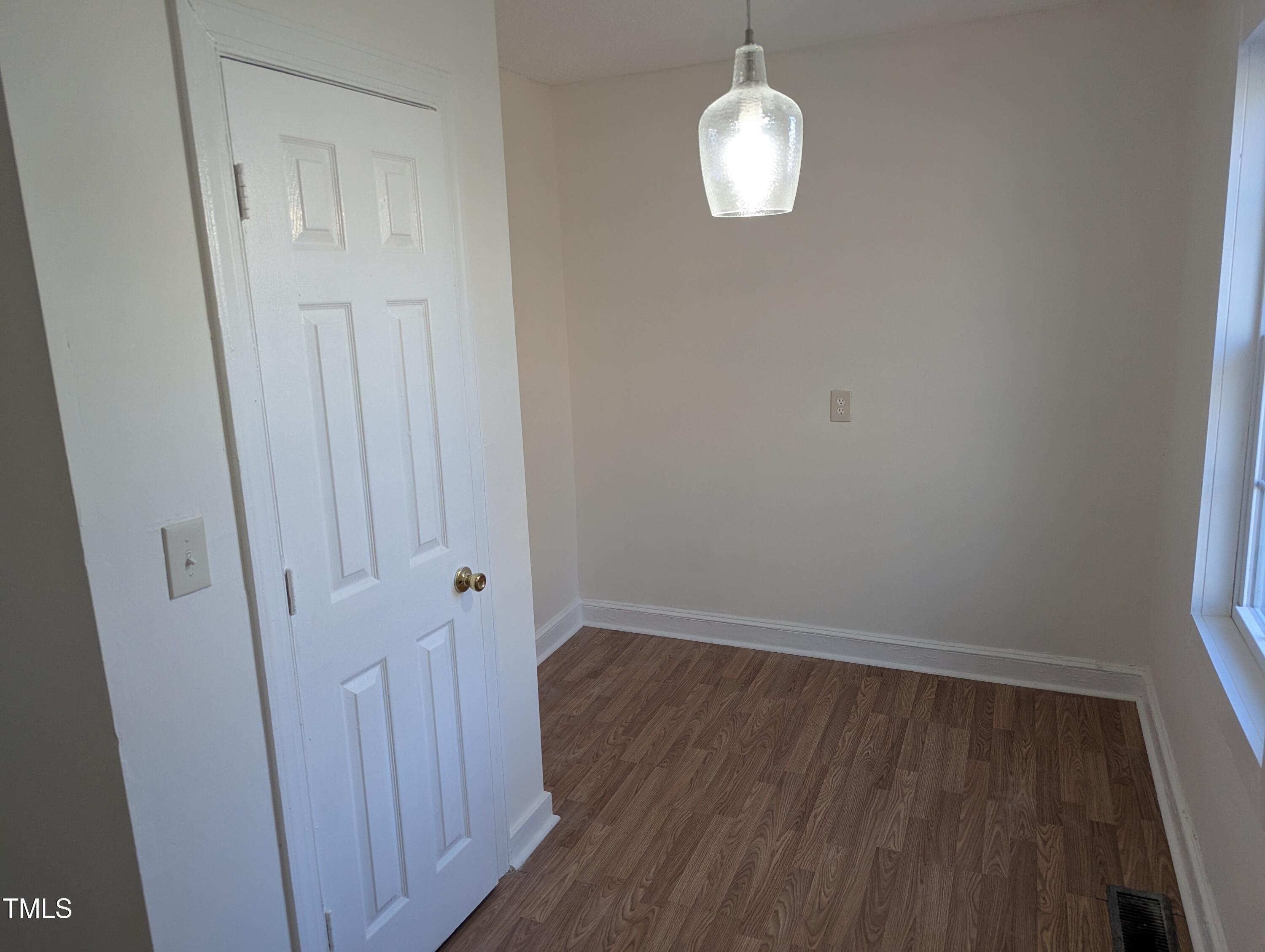 609 North Elizabeth Street, Unit B Durham, NC 27701 - Photo 9 of 11 a view of a room with wooden floor