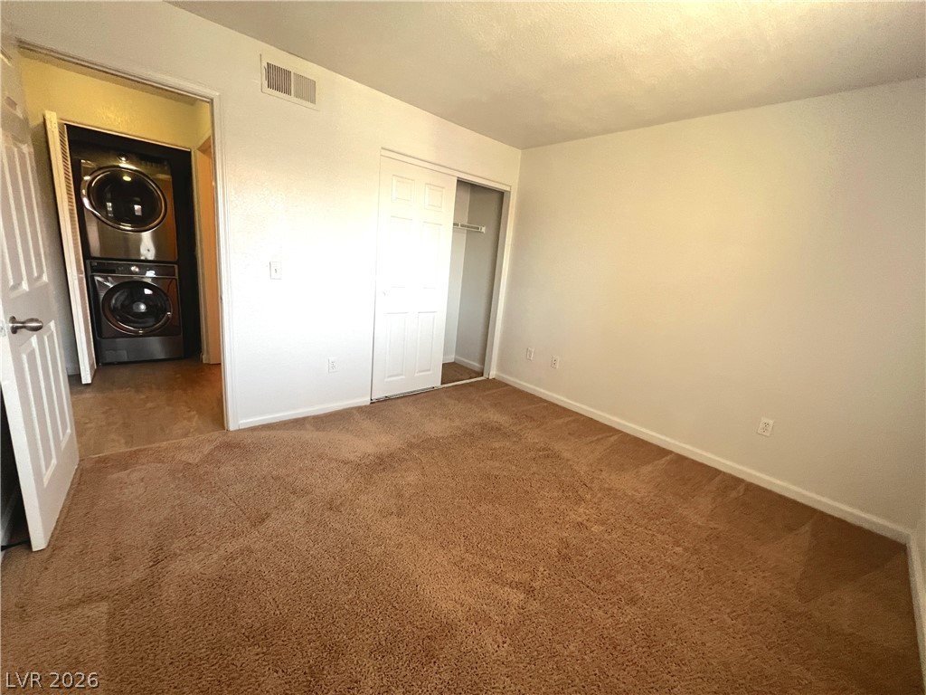 4730 East Craig Road, Unit 2104 Las Vegas, NV 89115 - Photo 10 of 20 A versatile room offering ample space with convenient in-unit laundry facilities.
