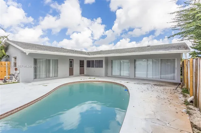 front view of house with barbeque oven