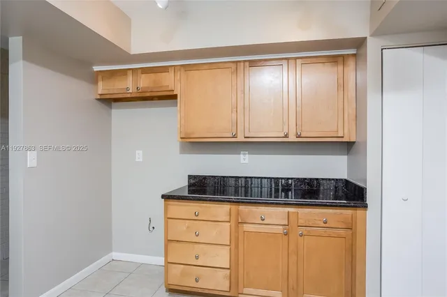 a view of cabinets and wooden cabinets