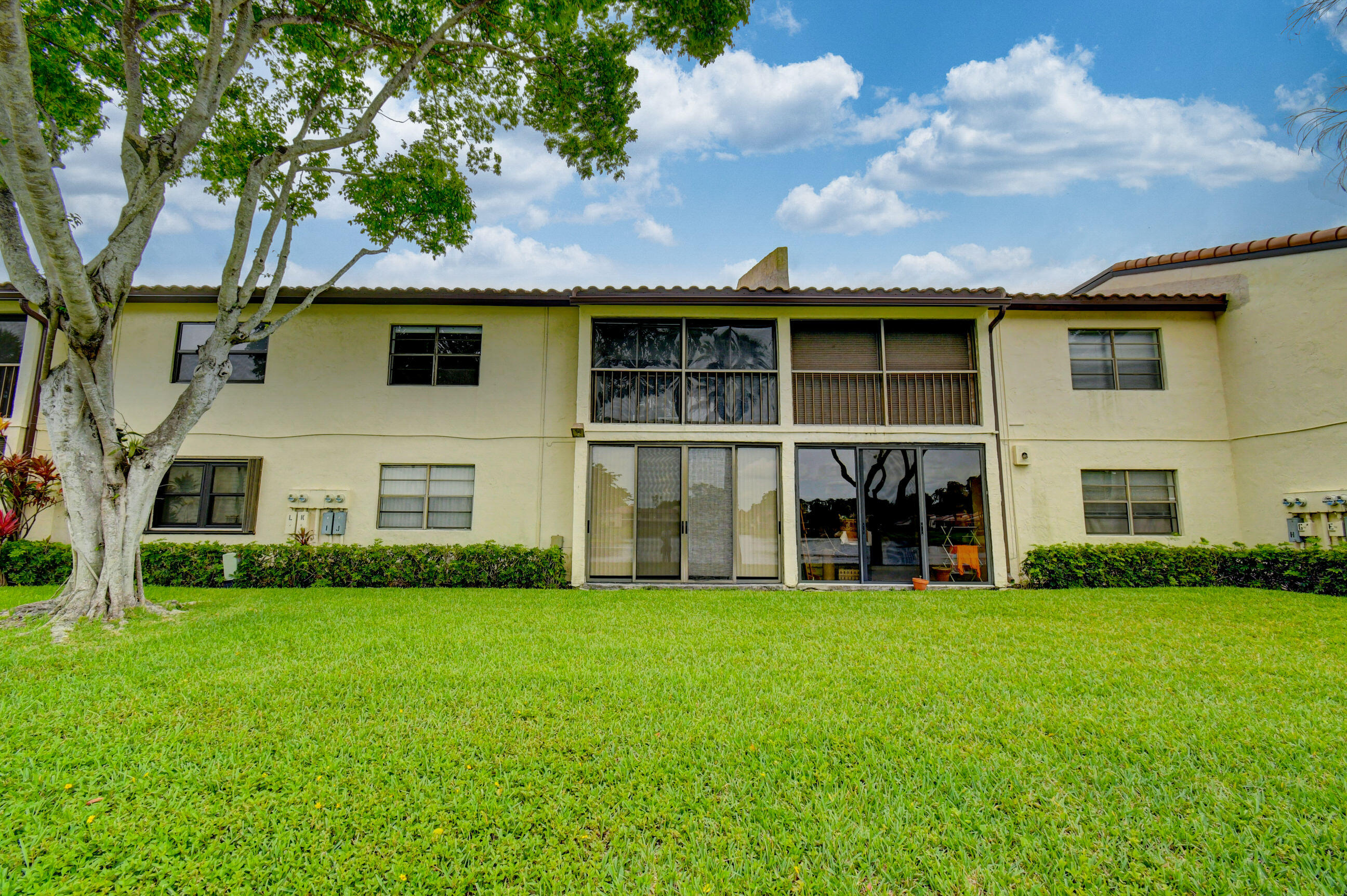 21851 Arriba Real, Unit 9J Boca Raton, FL 33433 - Photo 35 of 43 VIEW FROM THE LAKE