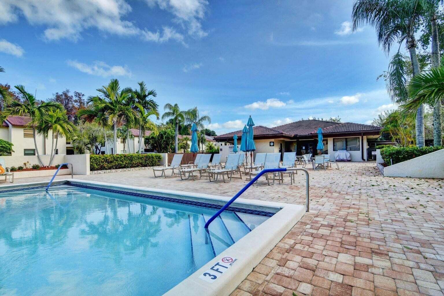 21851 Arriba Real, Unit 9J Boca Raton, FL 33433 - Photo 39 of 43 CLUB HOUSE POOL AREA