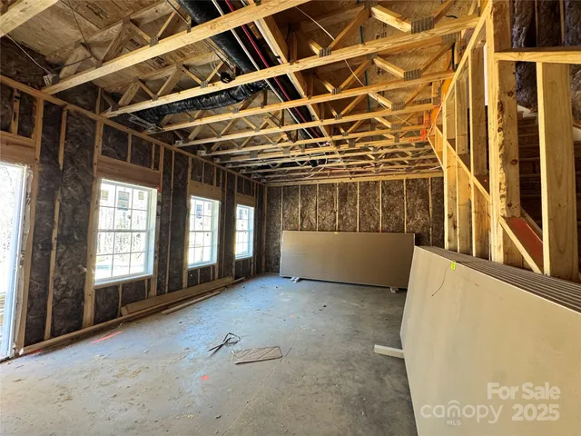 a view of a room with windows