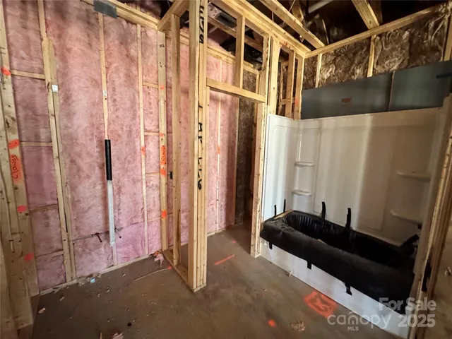 a view of a hallway with windows