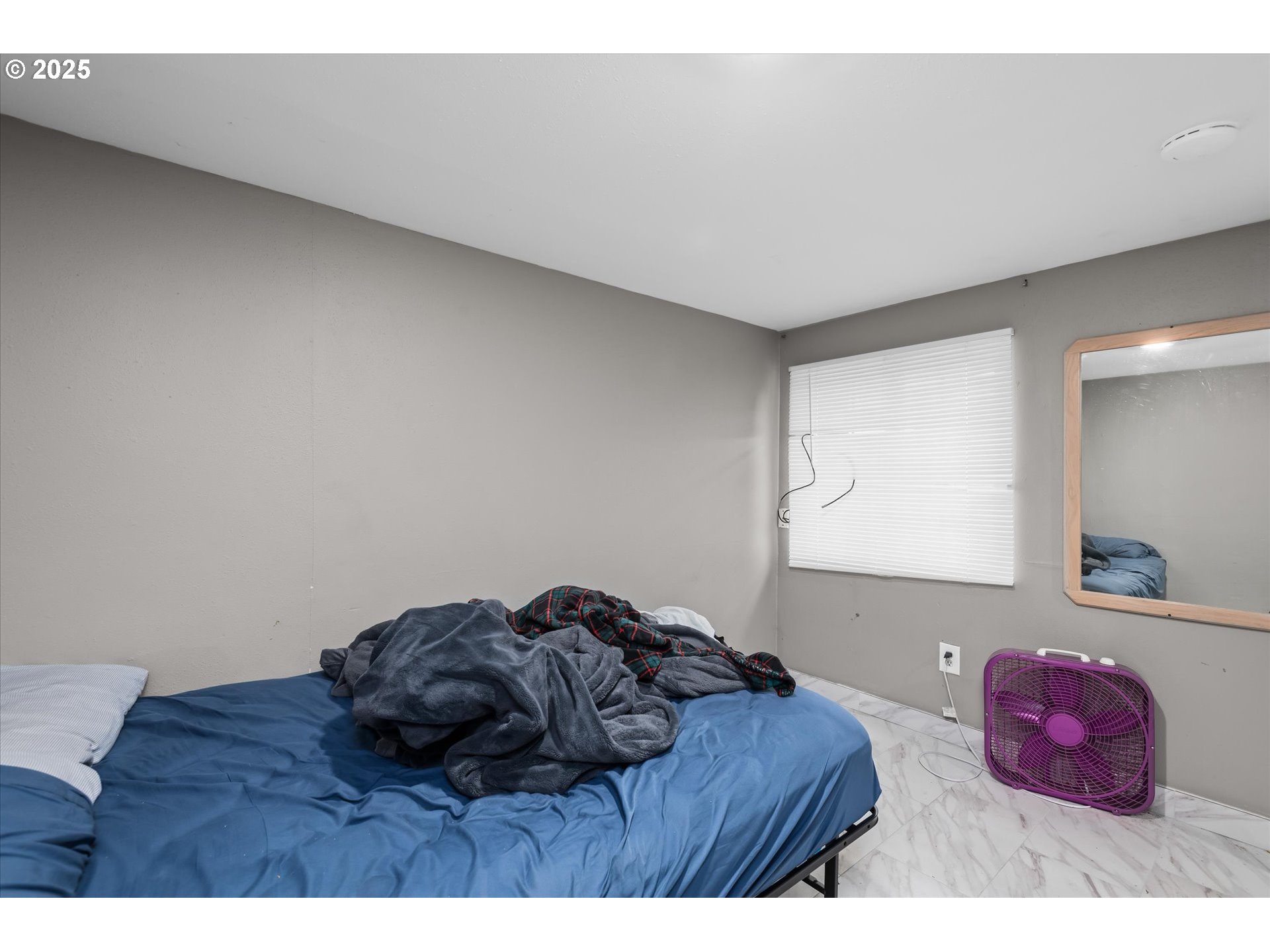 465 25th Street Springfield, OR 97477 - Photo 13 of 32 a bedroom with a bed and a couch