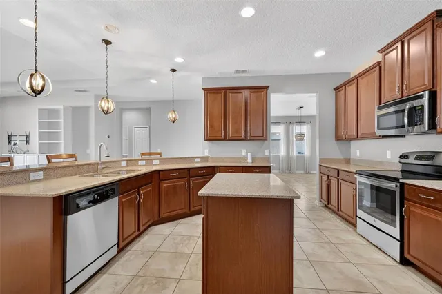 $399,999 | 2451 Plumadore Drive, Grand Island, FL 32735