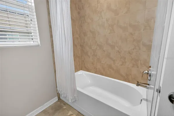 a bathroom with a bathtub