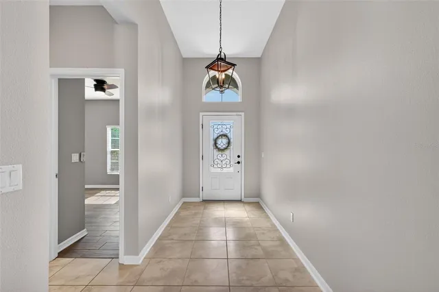 $399,999 | 2451 Plumadore Drive, Grand Island, FL 32735