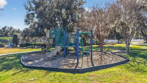 a view of a swimming pool with a sitting space