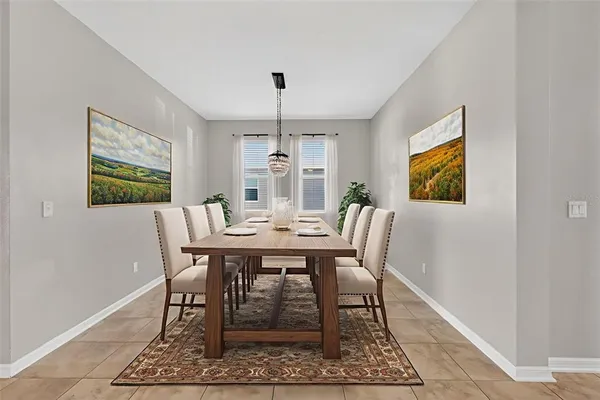 a view of a dining room with furniture